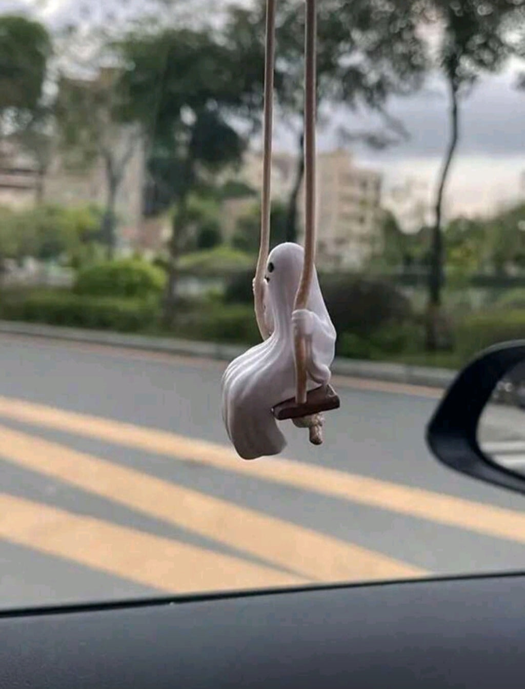 swinging ghost mirror pendant